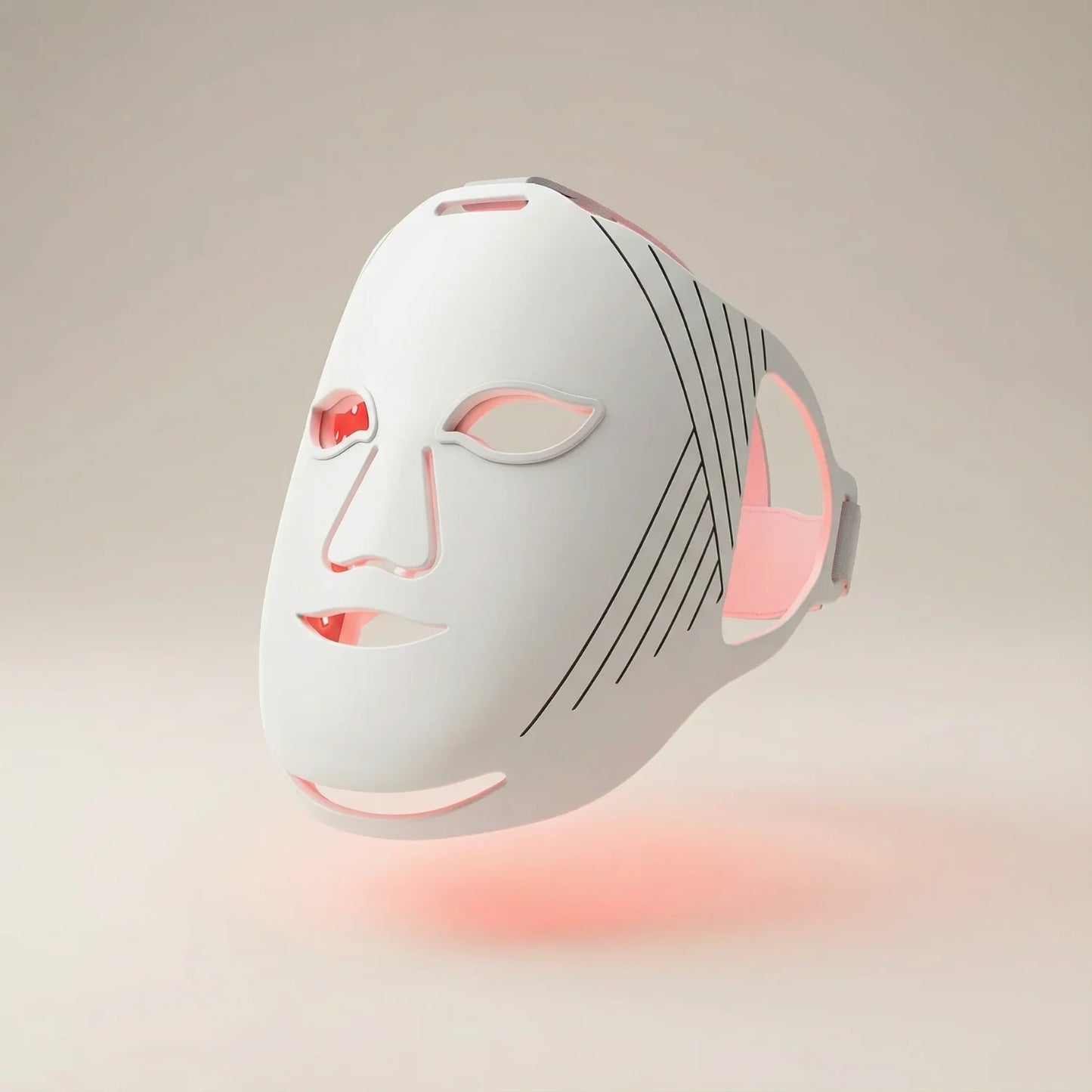 LED red light therapy mask for face wellness and skincare, glowing with soft red light