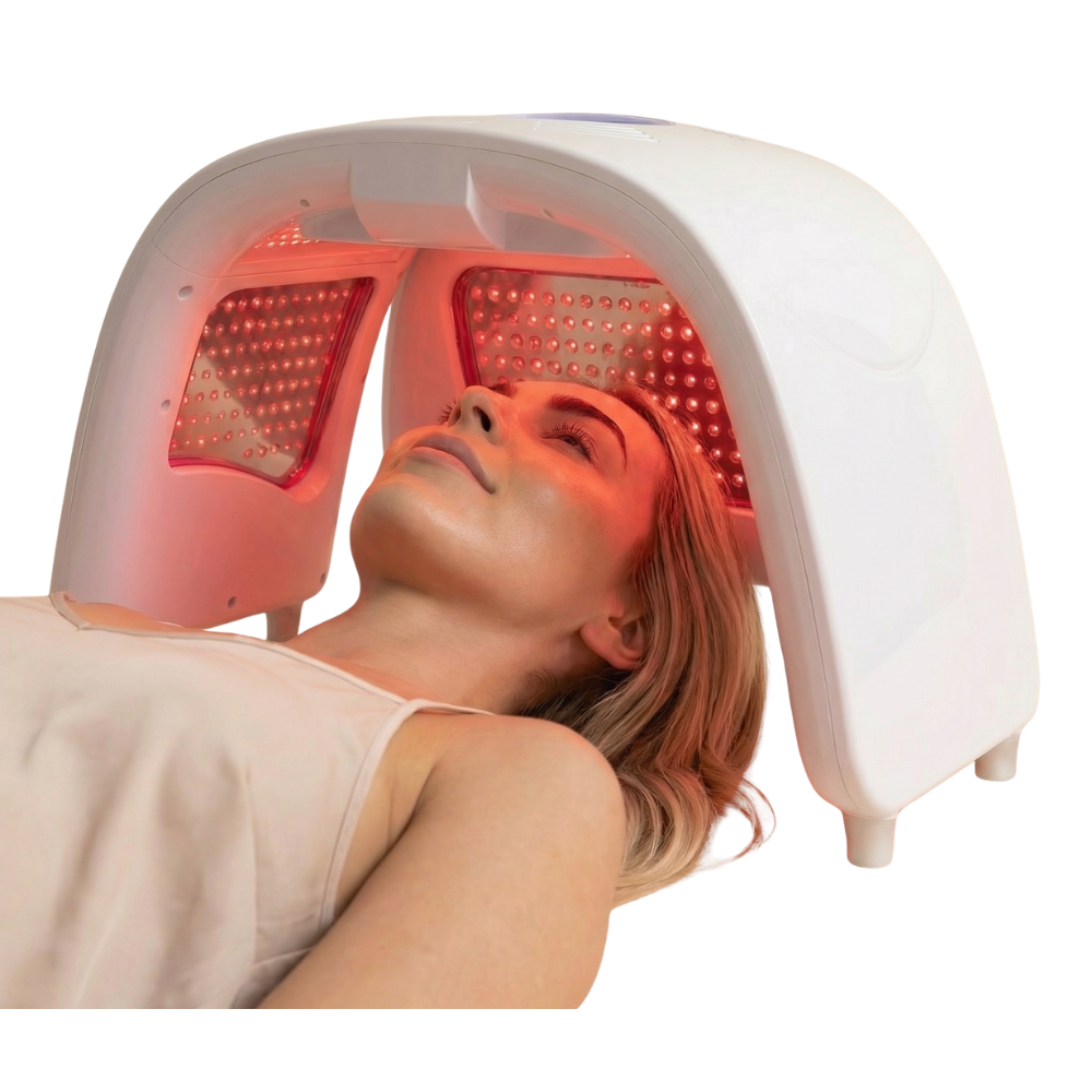 Person receiving red light therapy on a white background