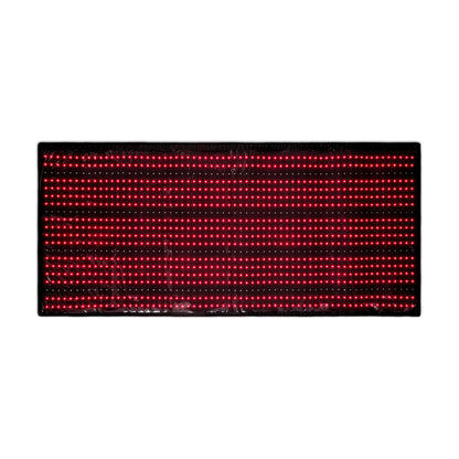 Flexible full-body red light therapy mat with 660nm and 850nm NIR LEDs laid out on a surface, highlighting its large, portable design for at-home muscle recovery and pain relief.