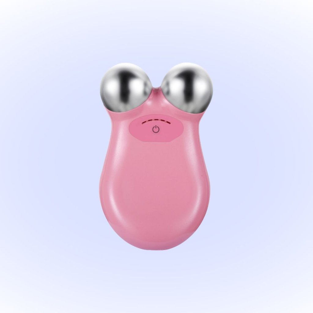 Pink version of the microcurrent facial device with dual spherical probes, designed for skin lifting and toning, suitable for home beauty treatments.