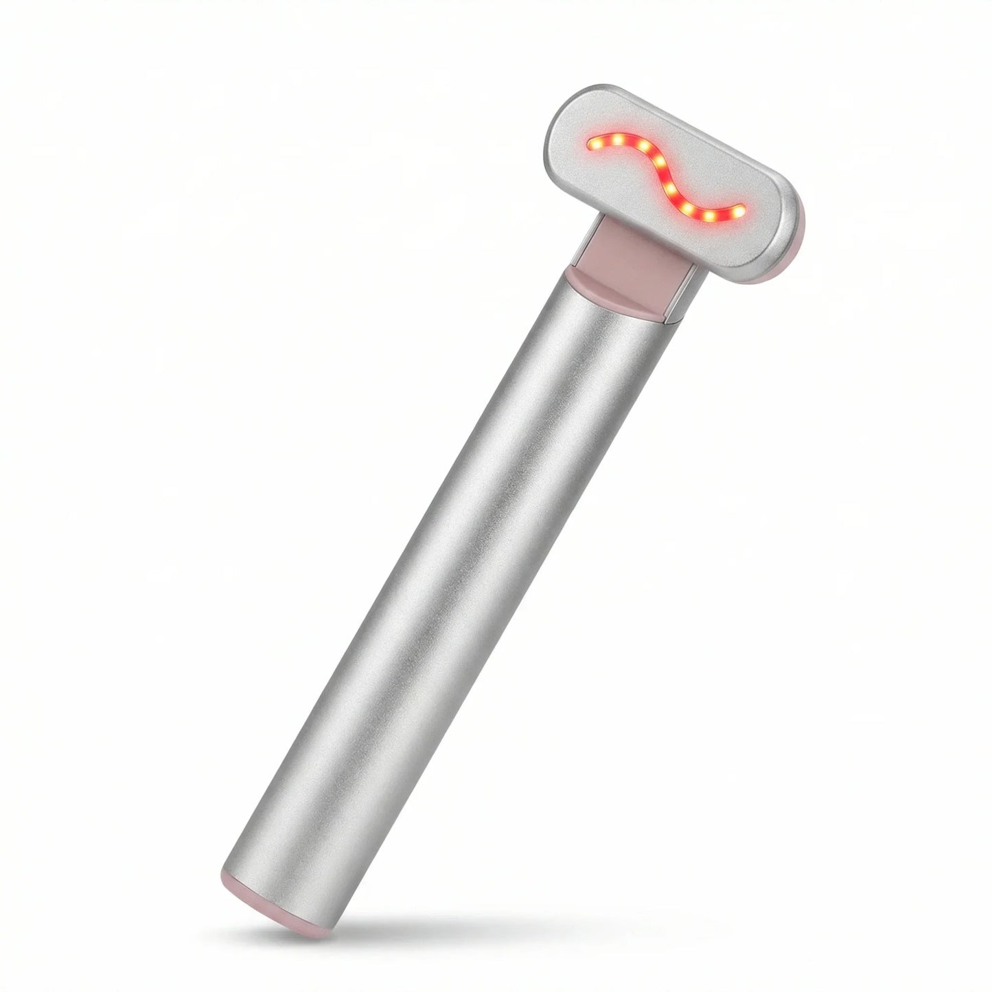 Portable silver red light therapy device with glowing LED lights on white background