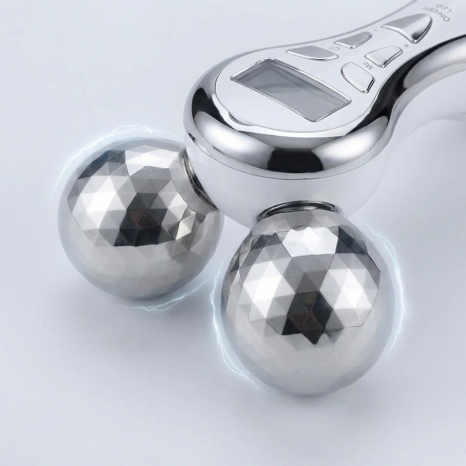 Metallic handheld device with two spherical weights on a light gray background
